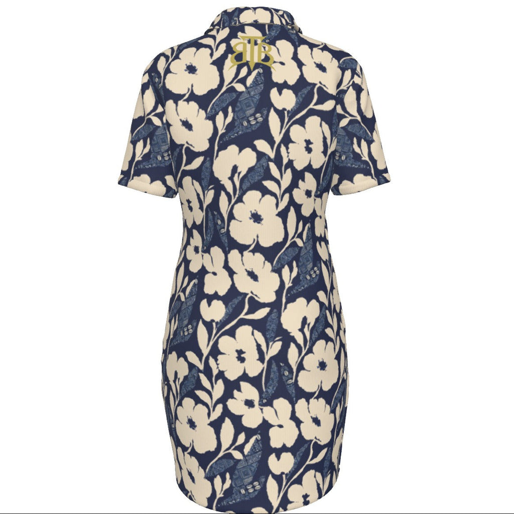 Shop the Adire Florale Midi Golf Polo Dress by Teddy Blaze. Stretch 180g/m² performance fabric featuring a classic polo collar and tailored midi silhouette.