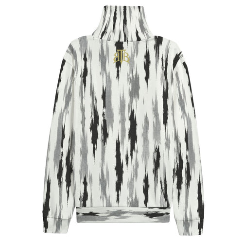 A long-sleeve mock neck sweatshirt featuring a vertical black, gray, and white ikat pattern, with a small gold embroidered 'JB' logo on the upper back.