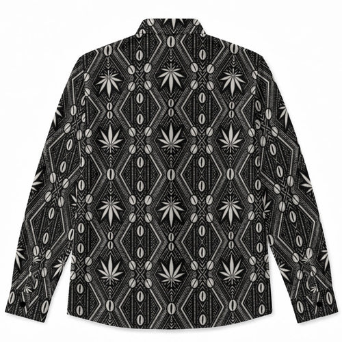 A long-sleeve button-up shirt with a black and white geometric pattern featuring diamond grids, vertical lines, and stylized cannabis leaf motifs, displayed flat against a white background.