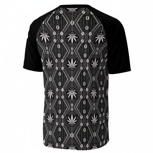 A short-sleeve raglan t-shirt with black sleeves and a black body featuring a white geometric tribal pattern and cannabis leaf motifs, shown on a plain white background.