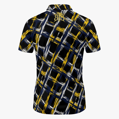 A short-sleeve collared shirt shown from the back, featuring a black base with a bold plaid pattern made of yellow and white brushstroke lines. A stylized gold 'JB' monogram is printed at the center of the back collar.