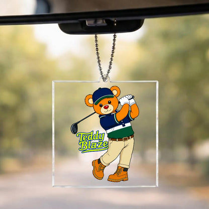 Car rearview mirror with a teddy bear-themed ornament labeled 'Teddy Blaze'.