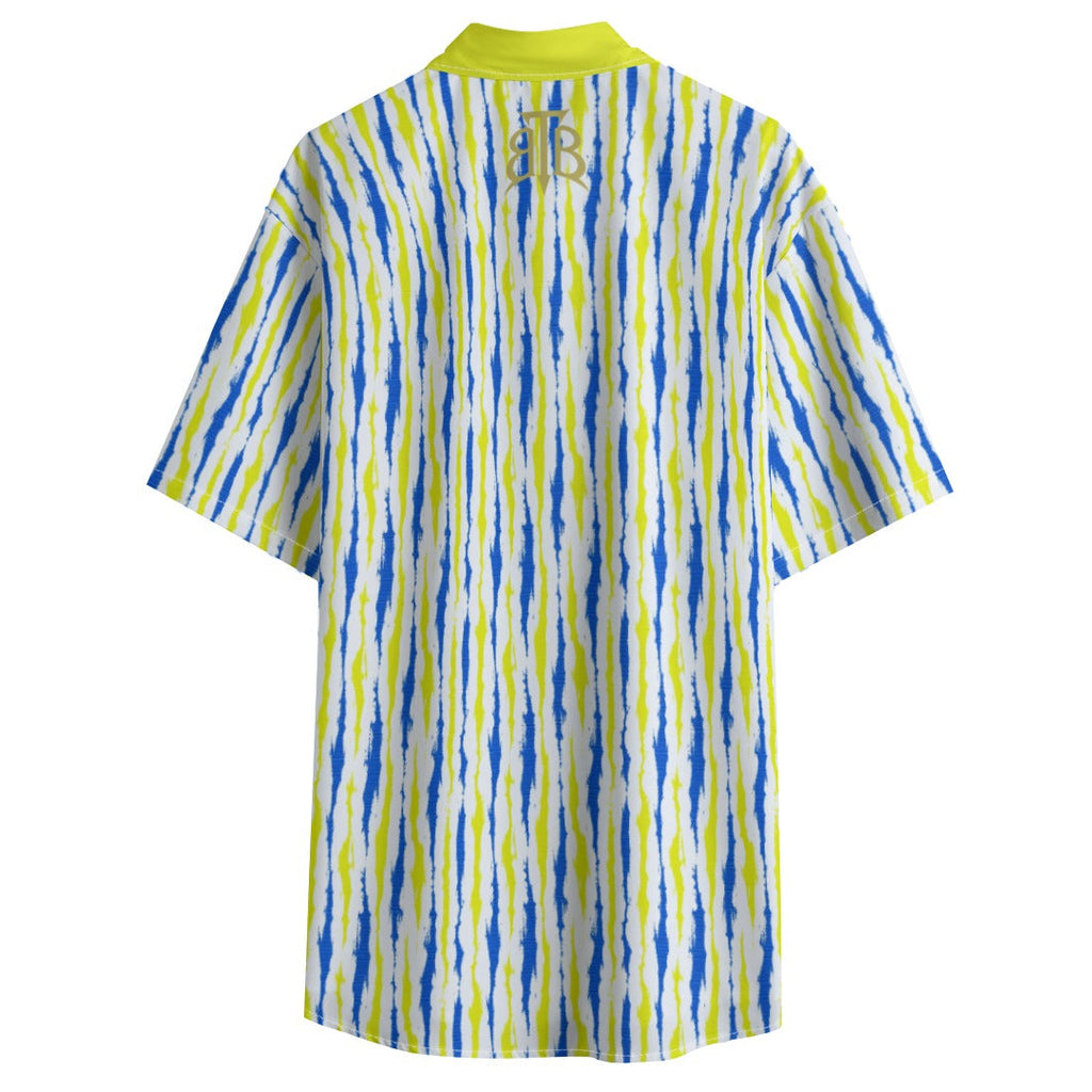 A short-sleeve collared shirt shown from the back, featuring a vertical ikat-style stripe pattern in blue, lime green, and white. It has a solid lime green collar and a small gold monogram logo printed on the upper back.