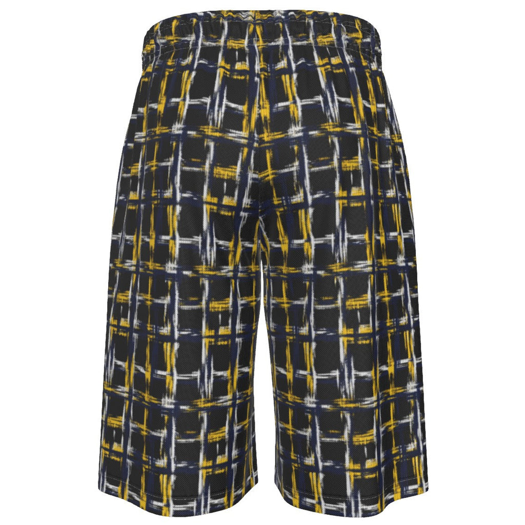 A pair of wide-leg shorts featuring a dark charcoal gray base with an abstract grid pattern in yellow and white, displayed against a solid white background.
