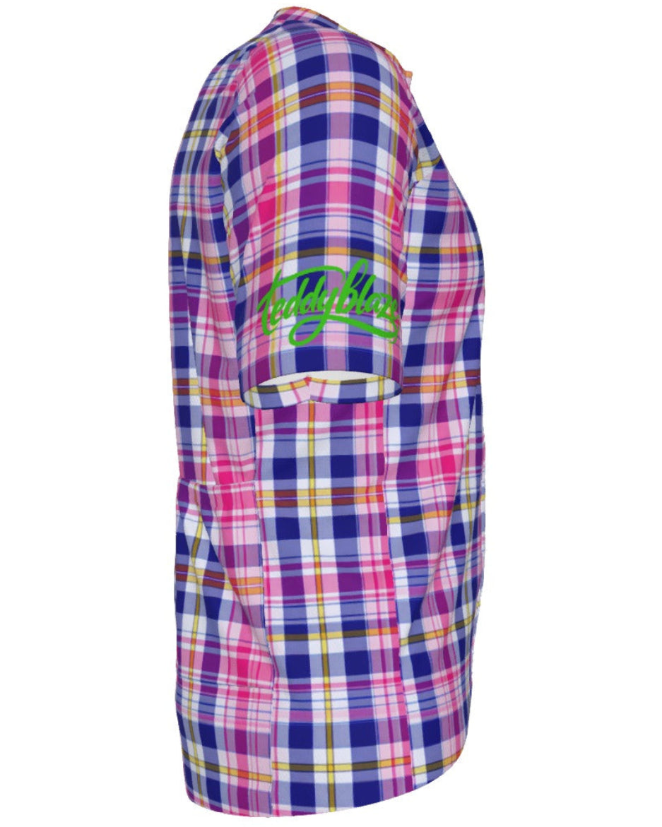 A short-sleeve plaid button-up shirt shown from the side, featuring a vibrant pink, purple, and blue tartan pattern with yellow and white intersecting lines. A bright green script logo is embroidered on the upper chest, and a front patch pocket is visible.