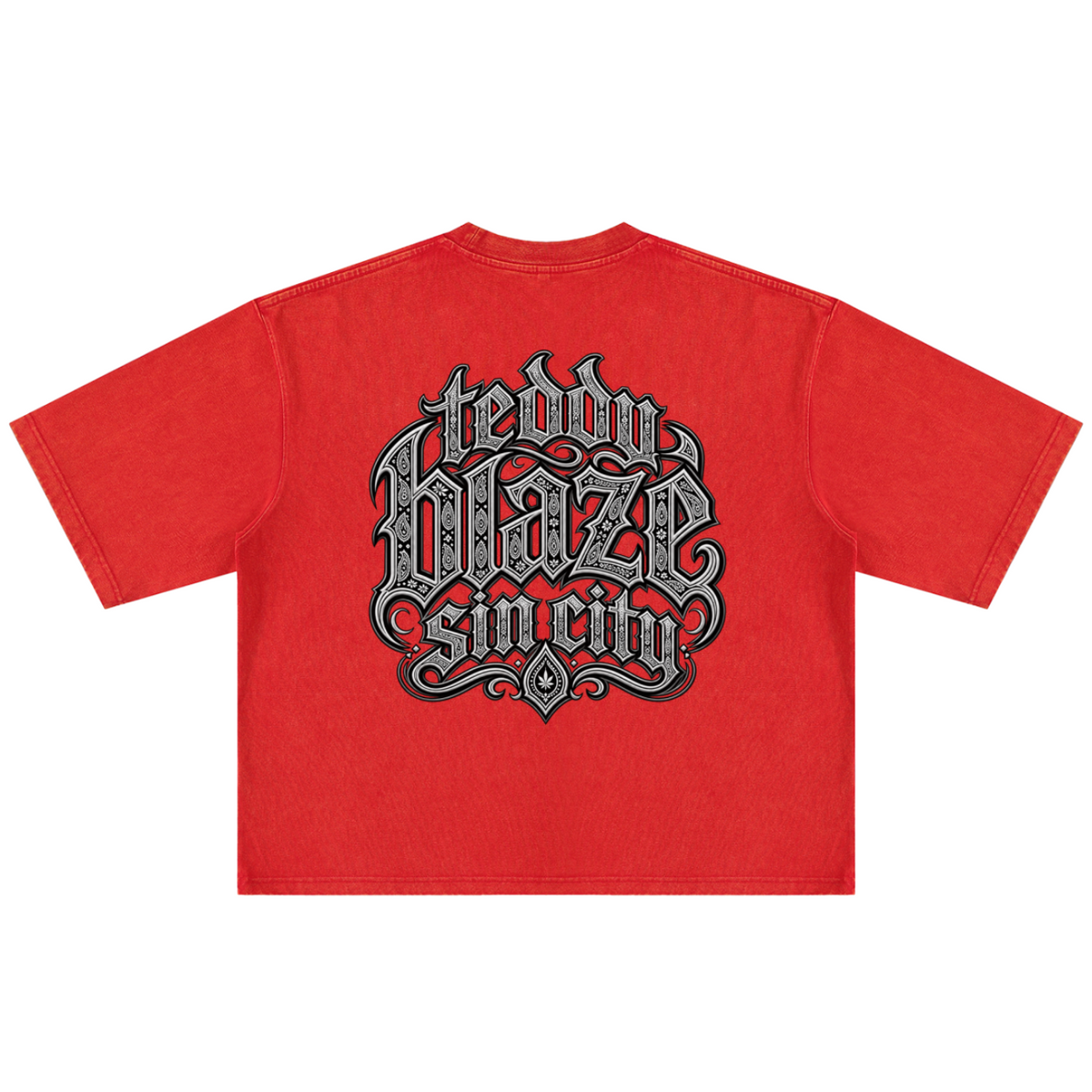 Elevate your streetwear with the Teddy Blaze Sin City Sacred Snow Wash Boxy Cotton Tee. Red snow-washed heavy cotton, tattoo praying hands print, and boxy cut. Shop NYC to Vegas style.