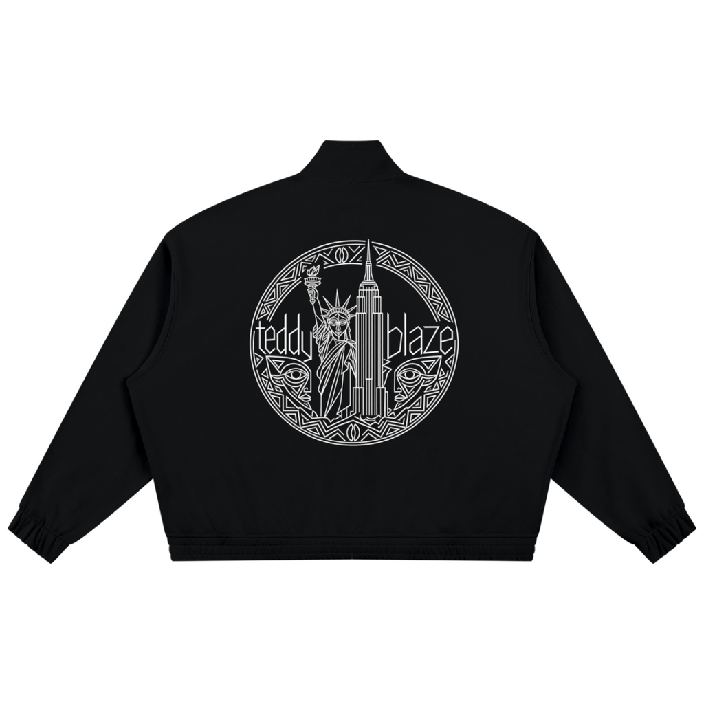 Elevate your outerwear rotation with the House of Teddy Blaze Afro Yorker Striped Sleeve Box Cut Pankou Jacket. Black 350 gsm heavyweight jacket, Pankou knot buttons, athletic sleeve stripes, Afro Yorker chest embroidery, and NYC Statue of Liberty back emblem. Shop NYC to Vegas style.