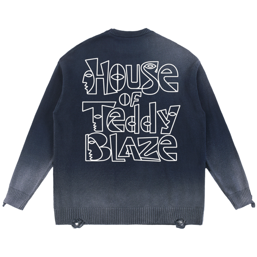 A dark gray to black gradient crewneck sweater shown from the back, featuring a large white graphic text print that reads 'House of Teddy Blaze' in a stylized outline font.