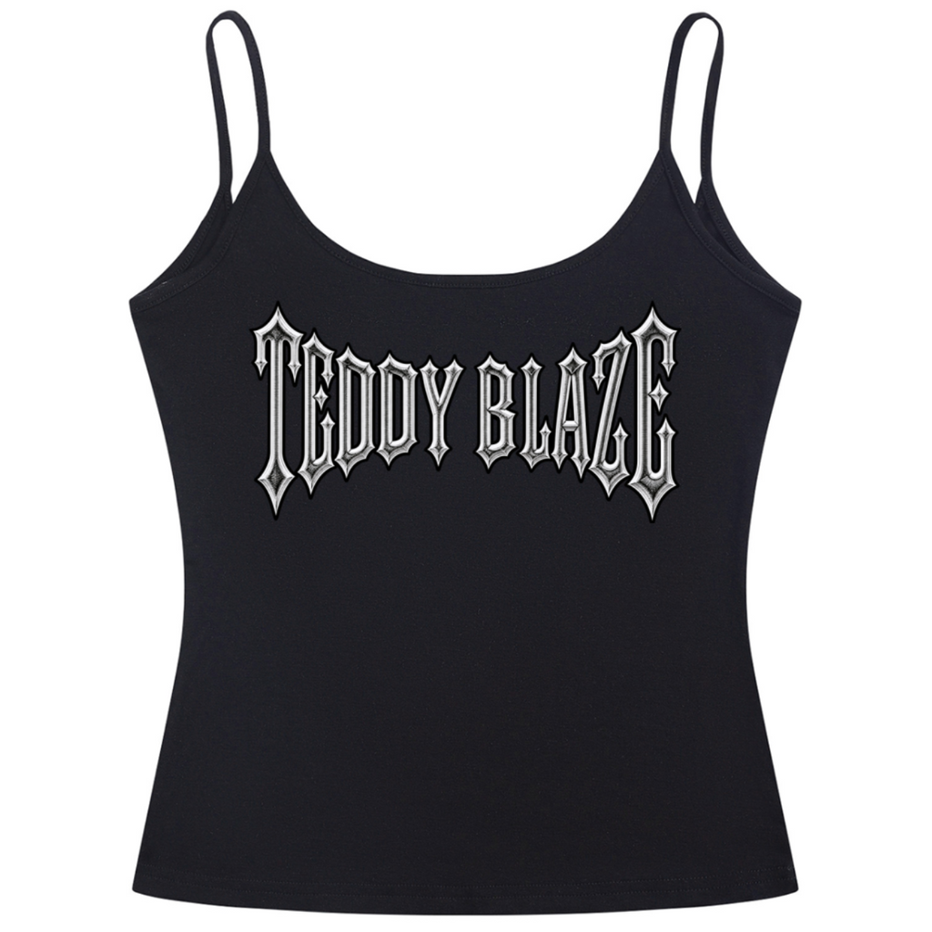 A black spaghetti-strap camisole crop top featuring the text 'TEDDY BLAZE' printed across the chest in a white gothic font, shown against a plain white background.