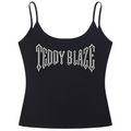 A black spaghetti-strap camisole crop top featuring the text 'TEDDY BLAZE' printed across the chest in a white gothic font, shown against a plain white background.