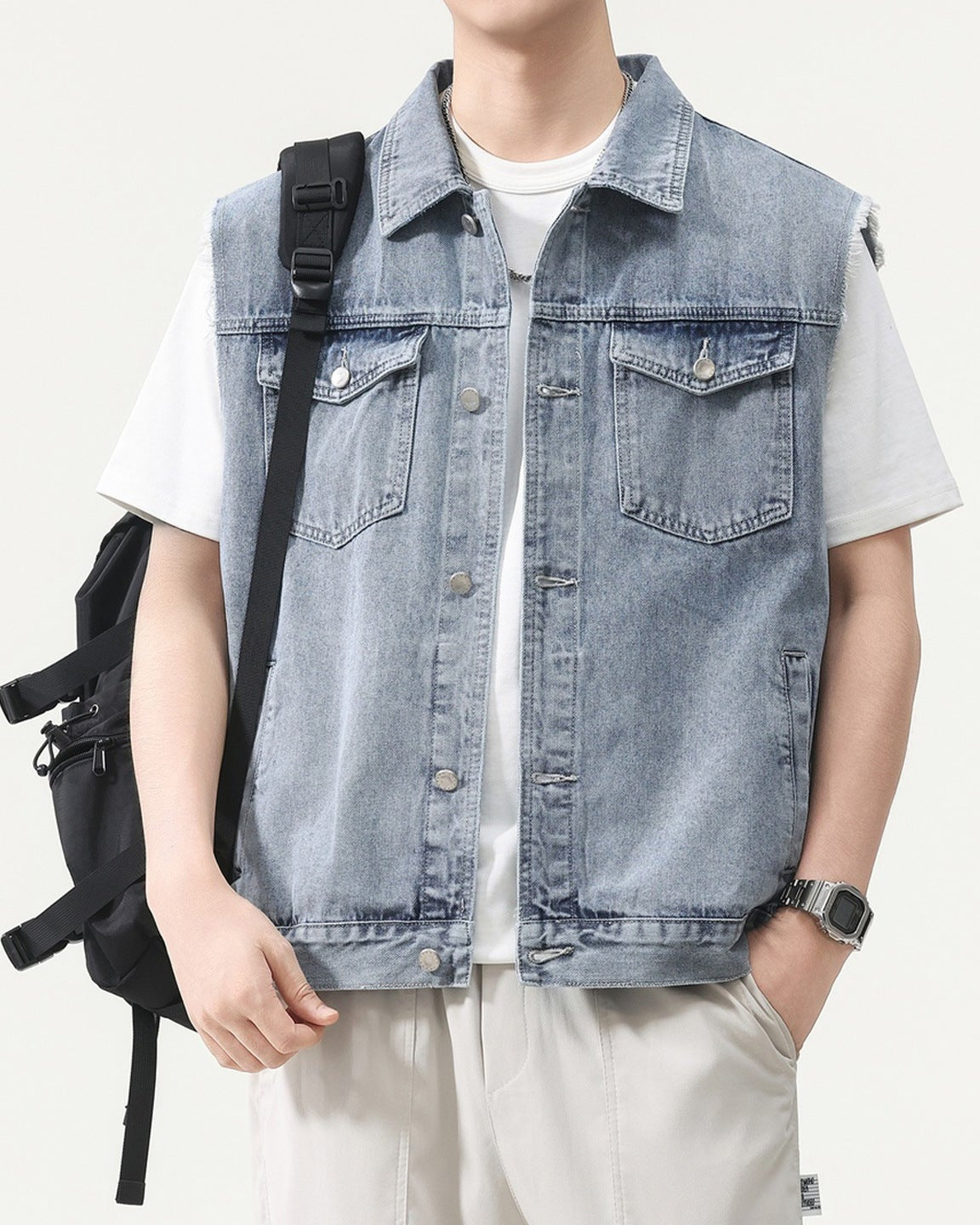 Shop the Urban Workwear Raw-Edge Denim Vest by Teddy Blaze. Loose fit cotton-blend utility vest featuring frayed armholes, multi-pocket storage, and turn-down collar.