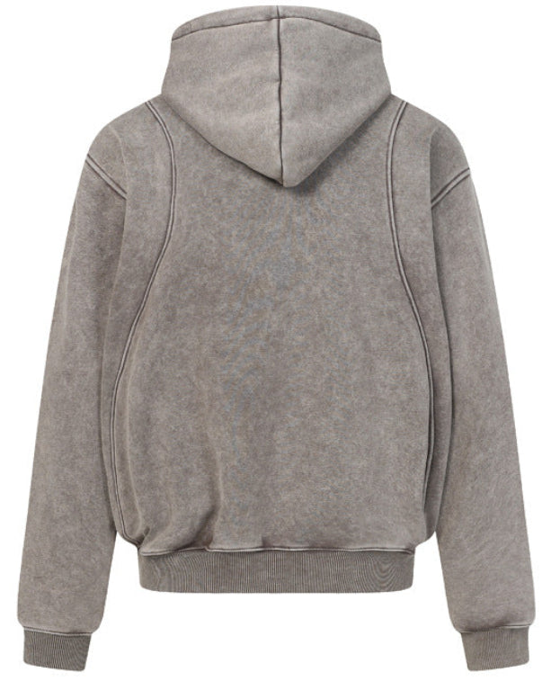 Discover the Teddy Blaze distressed washed patchwork hoodie. Available in black and khaki, featuring a high neck, zipper closure, and relaxed oversized fit.