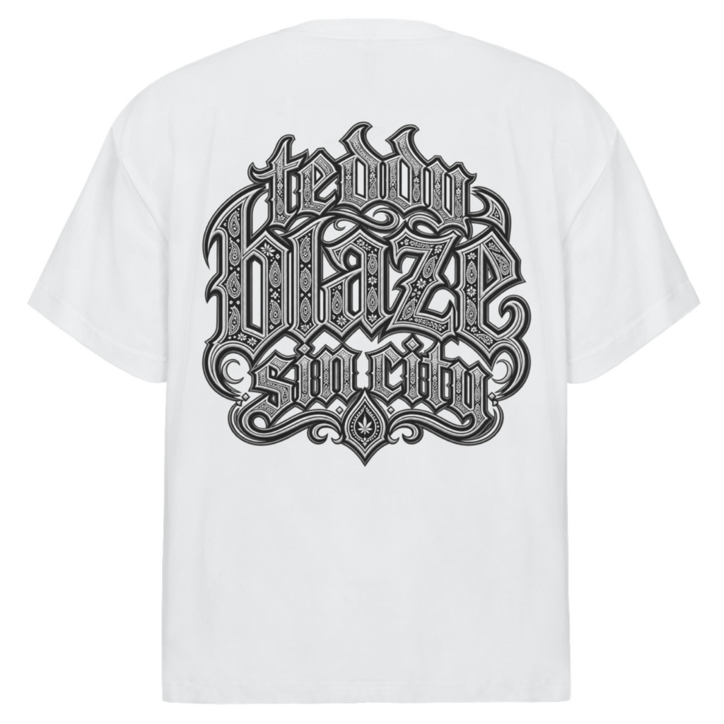 Elevate your casualwear with the Teddy Blaze Sin City Sacred Oversized Tee. Black stretch-cotton, tattoo praying hands print, and ornate back graphic. Shop NYC to Vegas style.