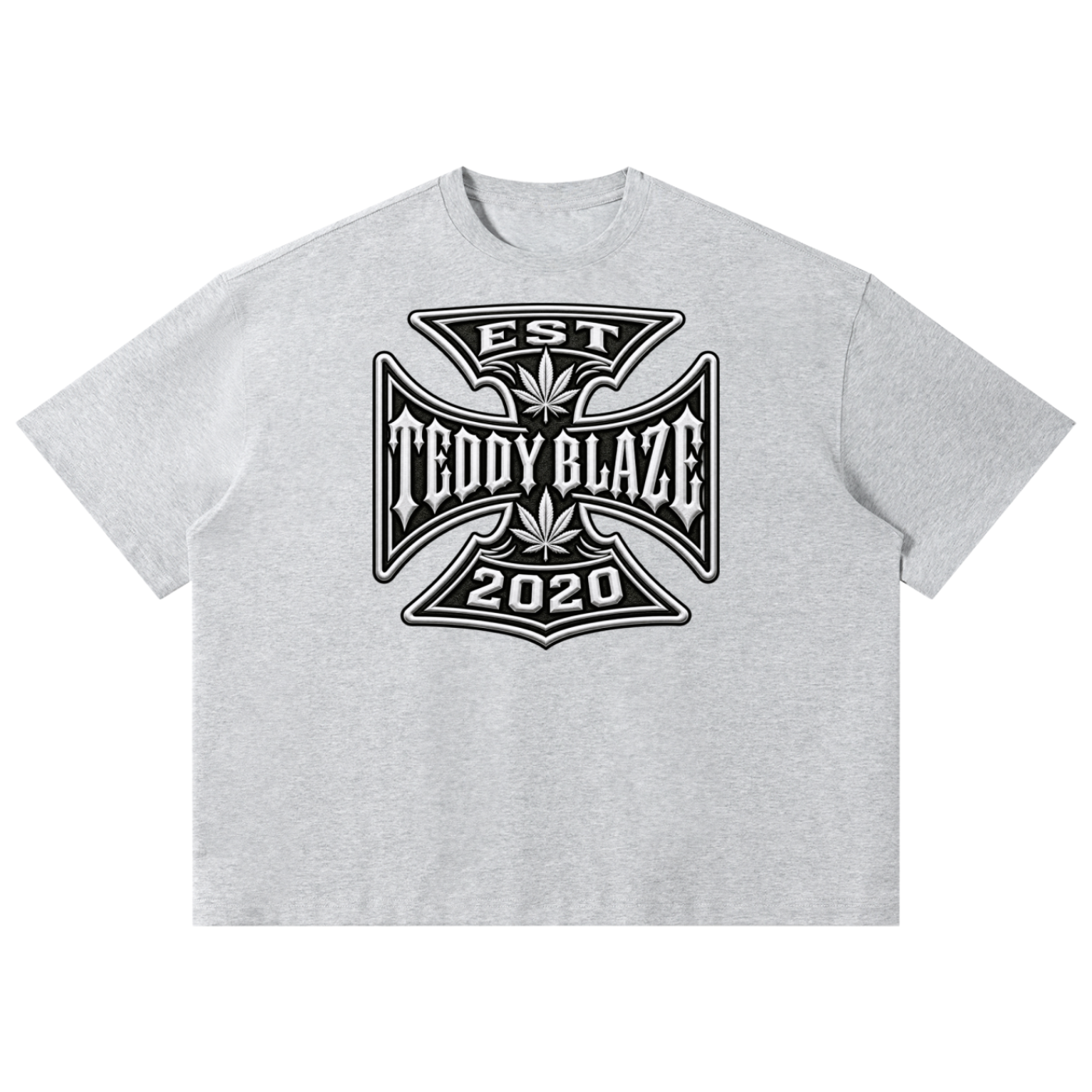 Shop the DaCruz Boxy Tee by Teddy Blaze. 220 GSM cotton-poly oversized drop-shoulder t-shirt with iron cross gothic emblem from TOPS BY TEDDY BLAZE.