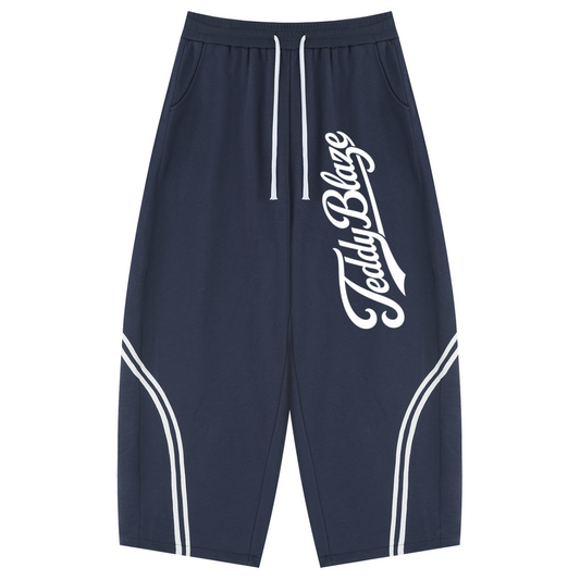 Unisex wide leg sweatpants with striped leg detailing, oversized Signature graphic, cotton-blend comfort, and BK Collection streetwear energy.