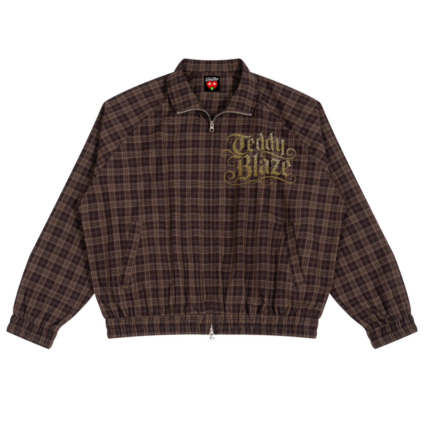 A brown and black plaid zip-up jacket with 'Teddy Blaze' embroidered in gold on the chest, displayed flat against a white background.