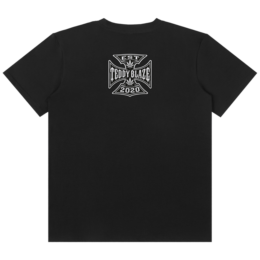 Shop the DaCruz Dragon Classic Tee by Teddy Blaze. 180 GSM cotton-spandex stretch tee featuring a botanical leaf dragon print and DaCruz cross back emblem from the TOPS line of The Mature Mocha Collection.