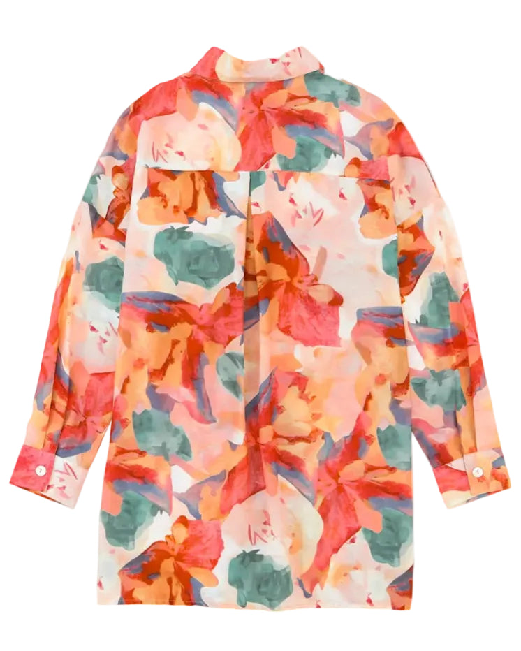 Shop the Iron + Ivy Floral Watercolor Longline Oversized Shirt by Teddy Blaze. Women’s relaxed longline button-down featuring an abstract coral, peach, and jade ink floral print.