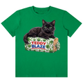 A green short-sleeve crewneck t-shirt featuring a graphic print of a black cat lying on a roll of patterned paper with the text 'TEDDY BLAZE'.