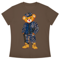 A brown short-sleeve crewneck t-shirt featuring a graphic of a cartoon teddy bear wearing a blue plaid jacket, matching plaid hat, patterned pants, and yellow boots, displayed on a solid white background.
