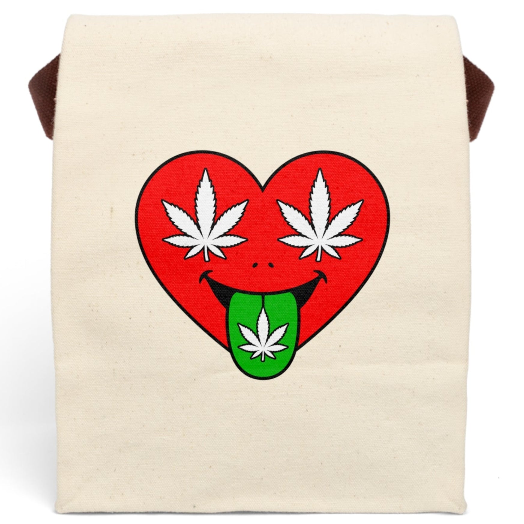 An off-white canvas tote bag with brown shoulder straps, featuring a graphic of a red heart with white cannabis leaves for eyes and a green tongue sticking out with a cannabis leaf.