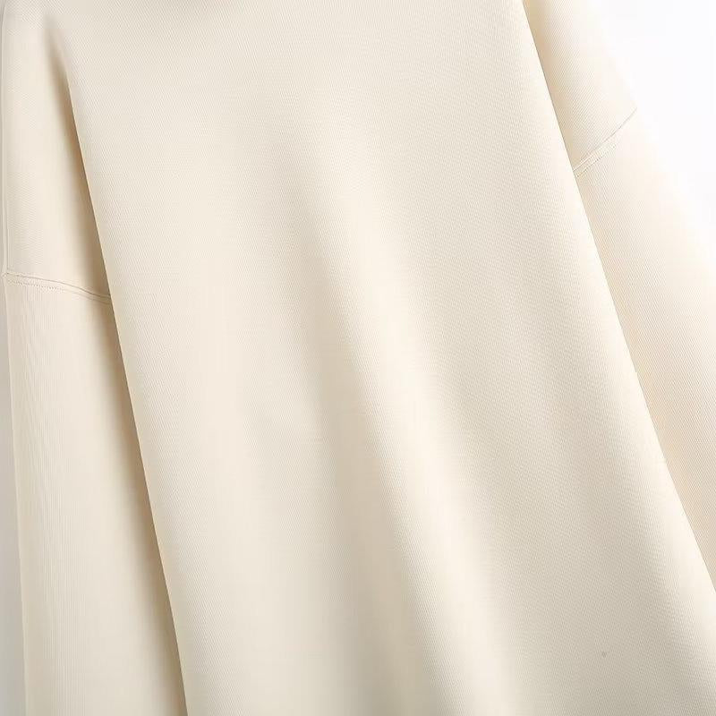Shop the Architectural Funnel Neck Oversized Top by Teddy Blaze. Heavyweight cotton double-knit pullover with a notched collar from THE IVY WOMAN collection.