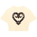 A cream-colored short-sleeve crop top featuring a large heart-shaped graphic on the chest made from plaid and patterned fabrics in brown, beige, and black.