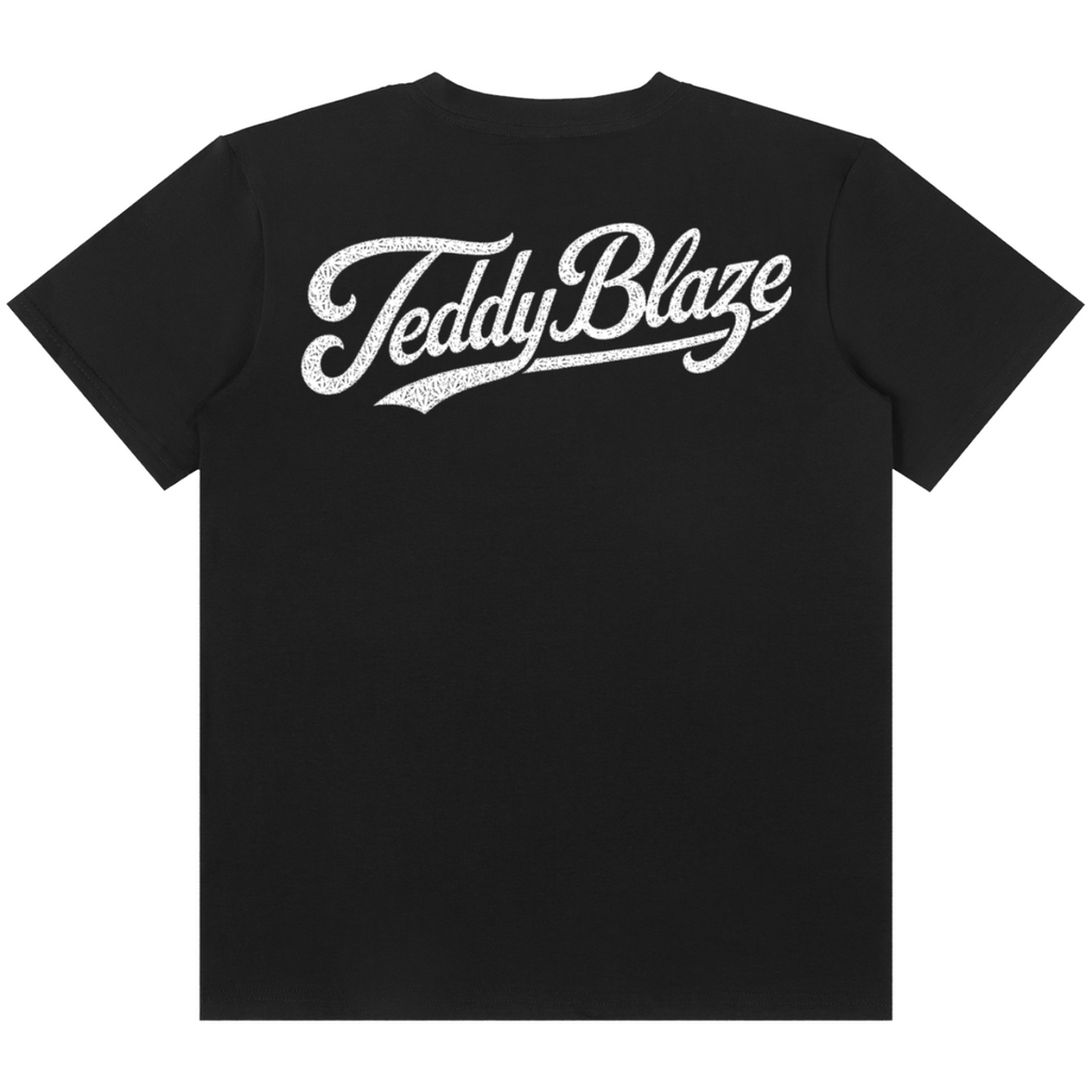 A black short-sleeve t-shirt with 'TeddyBlaze' printed across the chest in a white cursive script with a distressed texture, shown against a plain white background.