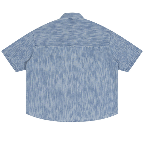Shop the Signature Boxy Vintage Wash Denim Camp Shirt by Teddy Blaze. 230 GSM lightweight washed blue denim camp shirt with white script branding from HIGH ROLLERS OUTERWEAR.