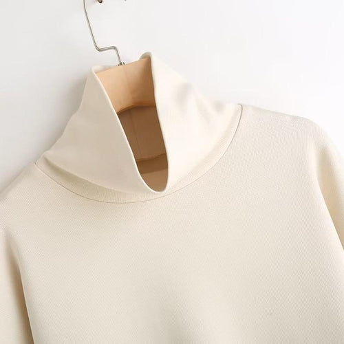 Shop the Architectural Funnel Neck Oversized Top by Teddy Blaze. Heavyweight cotton double-knit pullover with a notched collar from THE IVY WOMAN collection.