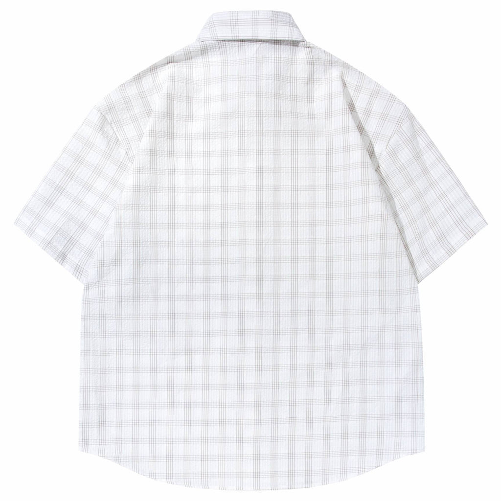 Shop the Iron + Ivy Short Sleeve Tattersall Plaid Shirt by Teddy Blaze. Oversized cotton-poly grid plaid button-down shirt with turn-down collar and chest pocket