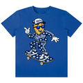 A royal blue short-sleeve t-shirt featuring a cartoon graphic of a character named 'Teddy Blay' in a white and blue outfit with cannabis leaf patterns, riding a skateboard, on a plain white background.