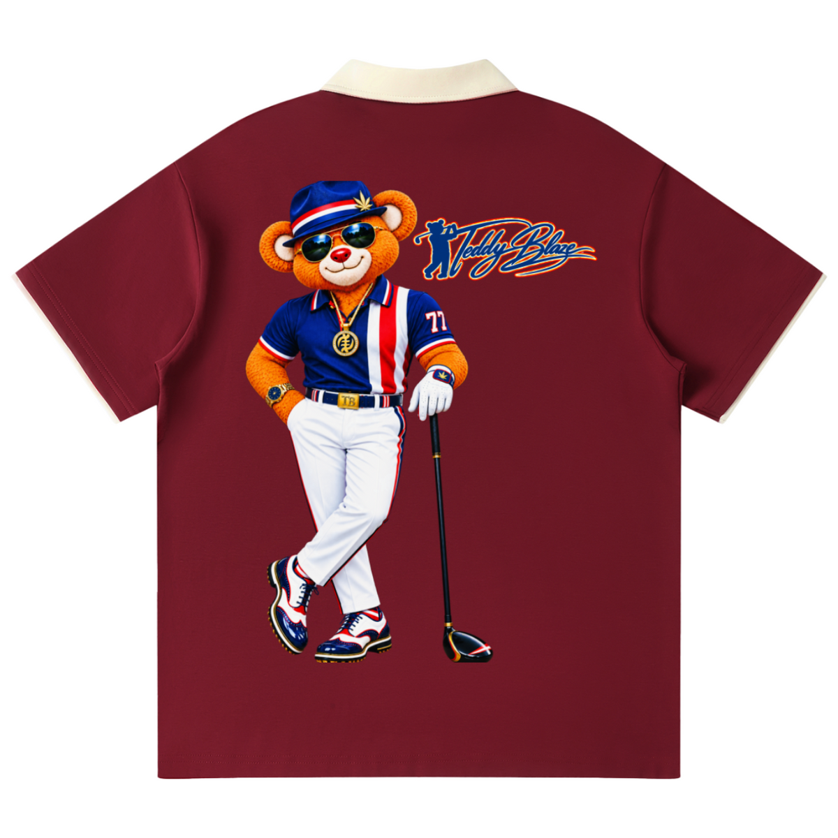 A maroon short-sleeve polo shirt shown from the back, featuring a large graphic of a cartoon teddy bear wearing a blue and orange golf uniform, white pants, and holding a golf club. The text 'Teddy Bear' is printed in blue script on the upper right side of the graphic.