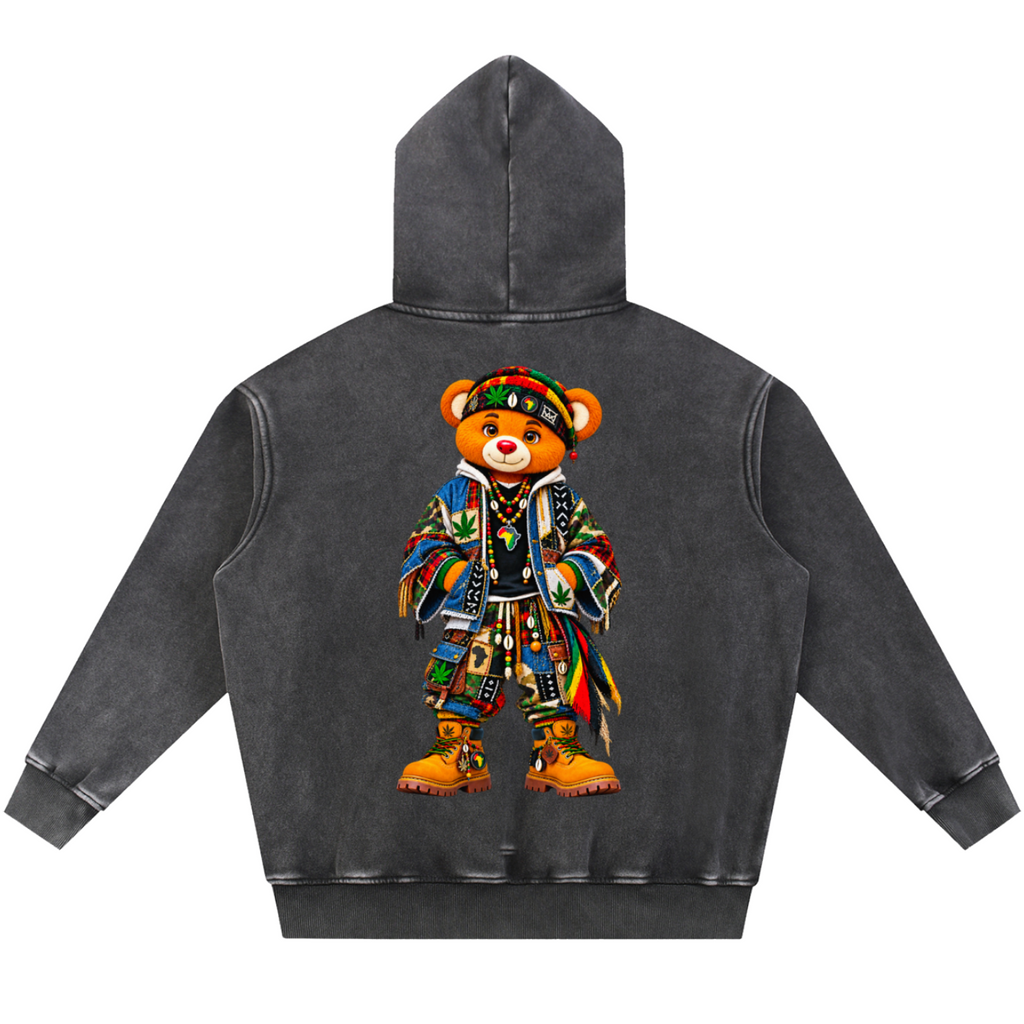 A dark gray washed hooded sweatshirt shown from the back, featuring a large graphic of a teddy bear wearing a colorful patterned outfit and hat.