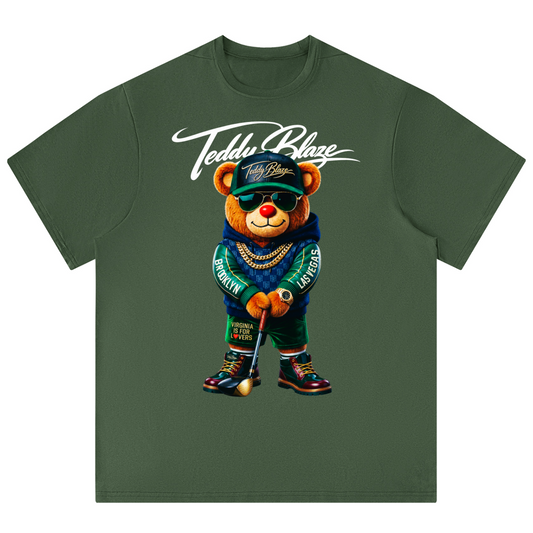 Green t-shirt with a bear graphic and 'Teddy Blaze' text on a white background