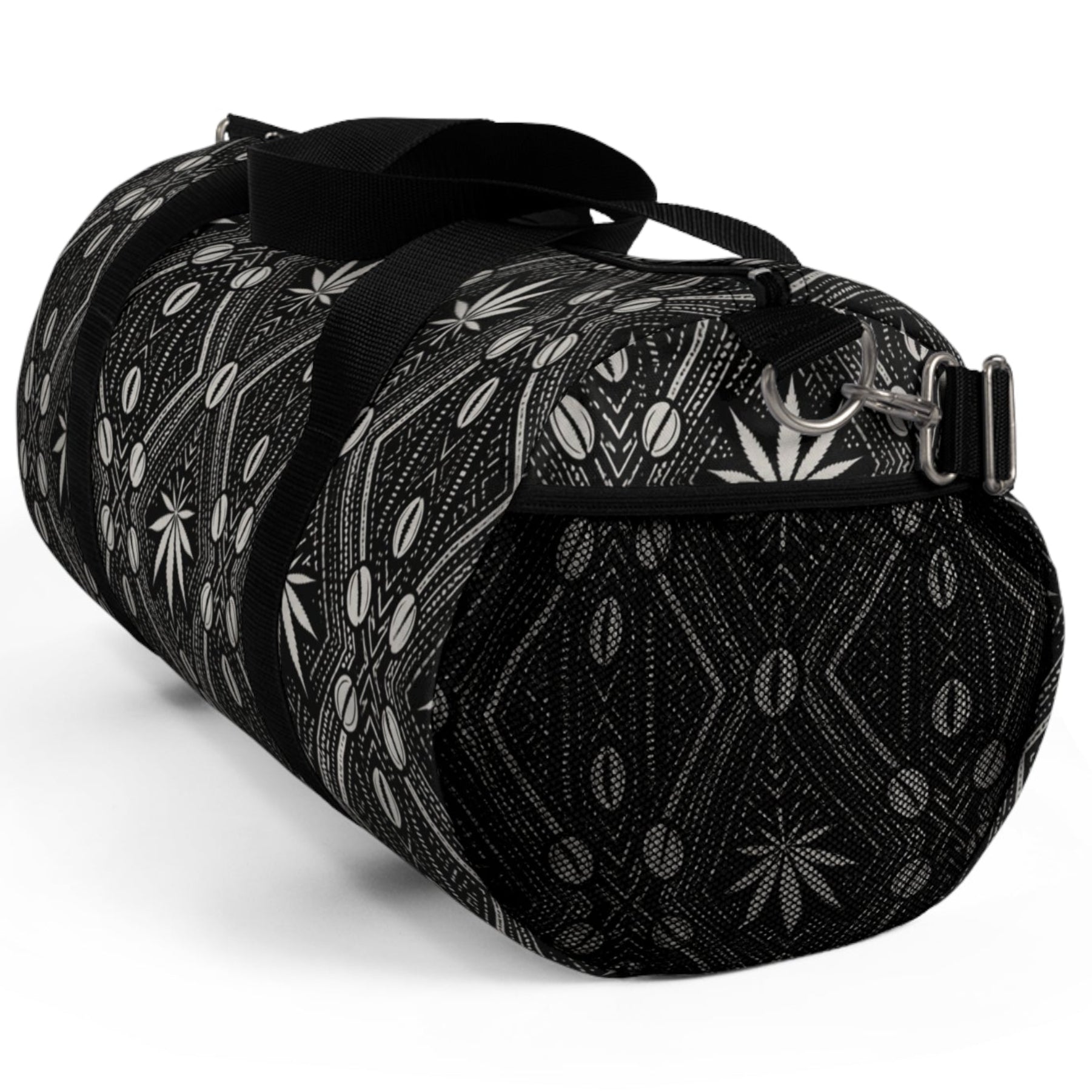 Meet the DaChek™ Getaway, a Teddy Blaze travel duffel featuring monochrome African-inspired patternwork, Oxford canvas, organized storage and an adjustable padded strap.