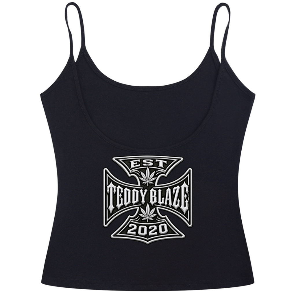 A black spaghetti-strap crop top featuring a white graphic print on the front with the text 'EST TEDDY BLAZE 2020' inside a Maltese cross design, shown against a plain white background.