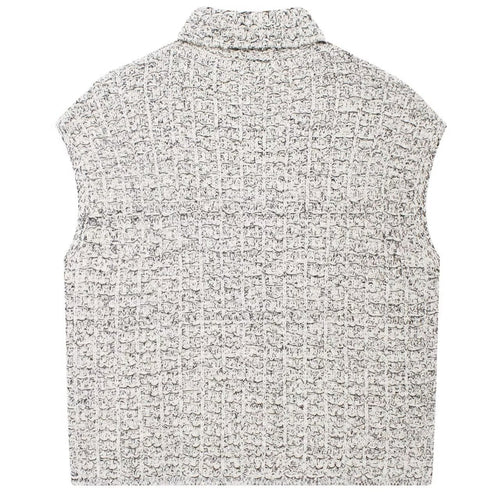 Shop the Bouclé Tweed Sleeveless Vest by Teddy Blaze. Single-breasted lapel vest featuring pearl buttons and textured bouclé tweed from THE IVY WOMAN collection.