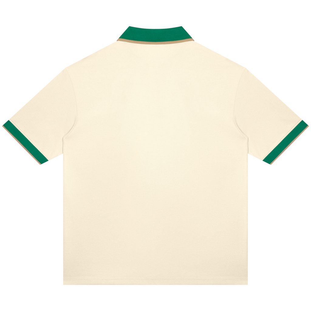 Shop the Signature On the Greens Slim Fit Golf Shirt by Teddy Blaze. 240 GSM cream piqué golf polo with forest green and gold trim from THE BLAZE MAN.