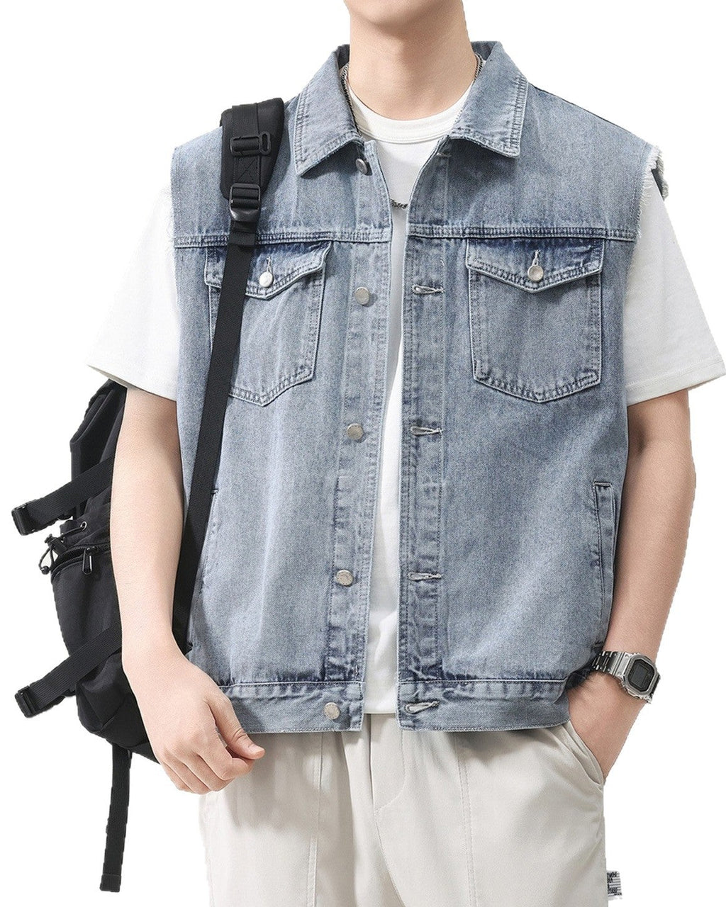 Shop the Urban Workwear Raw-Edge Denim Vest by Teddy Blaze. Loose fit cotton-blend utility vest featuring frayed armholes, multi-pocket storage, and turn-down collar.