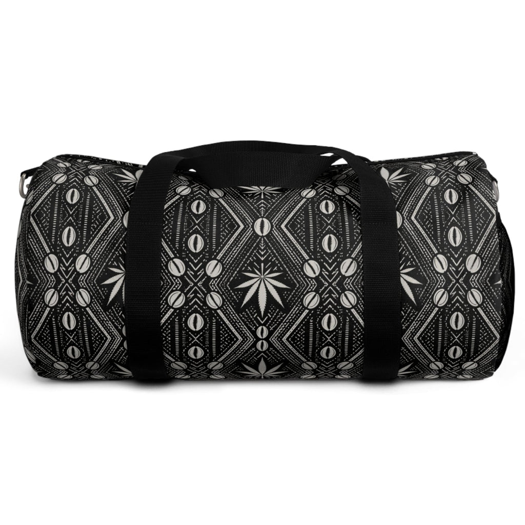 Meet the DaChek™ Getaway, a Teddy Blaze travel duffel featuring monochrome African-inspired patternwork, Oxford canvas, organized storage and an adjustable padded strap.