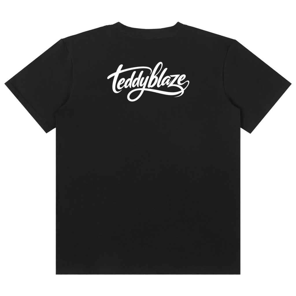 Shop the V is for Vapor Classic Tee by Teddy Blaze. 180 GSM cotton-spandex stretch tee with iconic mask and smoke graphic from the TOPS line of The Mature Mocha Collection.