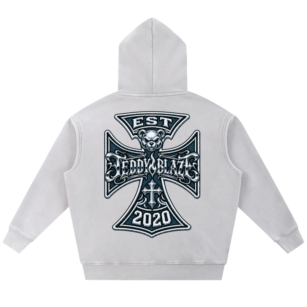 Shop the Fuego Cruz Snow Washed Fleece Pullover Hoodie by Teddy Blaze. Heavyweight 355 gsm snow-wash fleece hoodie with gothic chest logo and DaCruz back crest.