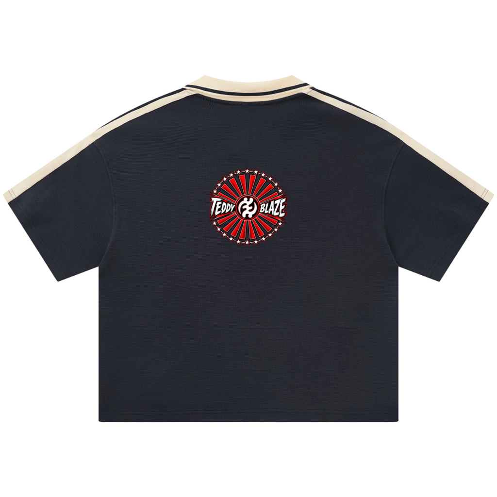 Discover the Teddy Blaze Brand Rising Contrast Polo, a heavyweight boxy polo featuring Teddy Blaze Samurai, Gye Nyame artwork and contrast trim.
