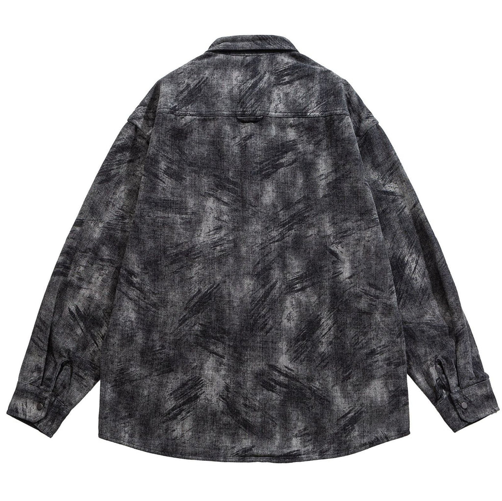 Shop the Iron + Ivy Mineral Wash Button-Down Overshirt by Teddy Blaze. Loose fit dark grey cotton-blend button-up featuring a distressed brushstroke wash and dual chest pockets.