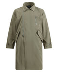 Discover the Teddy Blaze green asymmetric zip trench coat. Featuring a bold diagonal front zipper, turn-down collar, structured flap pockets, and a relaxed longline silhouette, this piece delivers architectural edge for transitional weather.