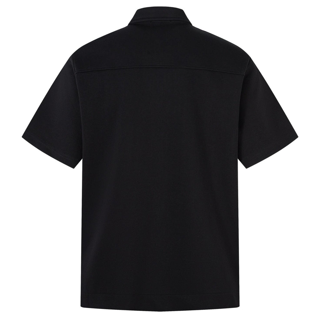 Shop the Retro Button Cutaway Polo Shirt by Teddy Blaze. Wrinkle-resistant technical interlock polo featuring retro silver buttons and a cutaway hem from THE IVY MAN.
