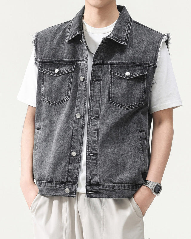 Shop the Urban Workwear Raw-Edge Denim Vest by Teddy Blaze. Loose fit cotton-blend utility vest featuring frayed armholes, multi-pocket storage, and turn-down collar.