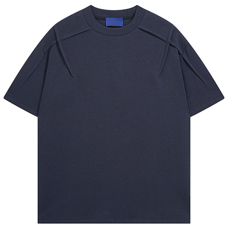 Shop the Architectural Pleat Drop Shoulder Tee by Teddy Blaze. Premium cotton-blend loose-fit t-shirt featuring diagonal chest pleat seams from THE IVY MAN.