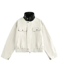 Discover the Teddy Blaze cotton bomber jacket featuring a contrasting black faux-leather stand collar. Available in beige and dark blue colorways, this piece blends structured utility with modern street-luxury styling.